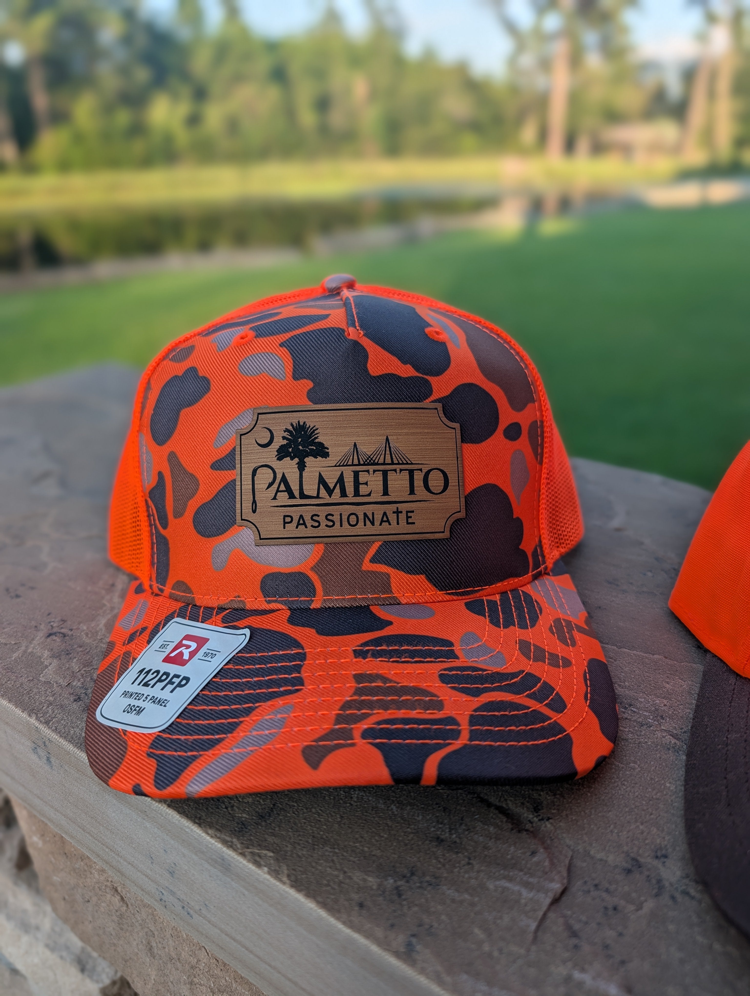 Hat: Blaze orange / old school camo front