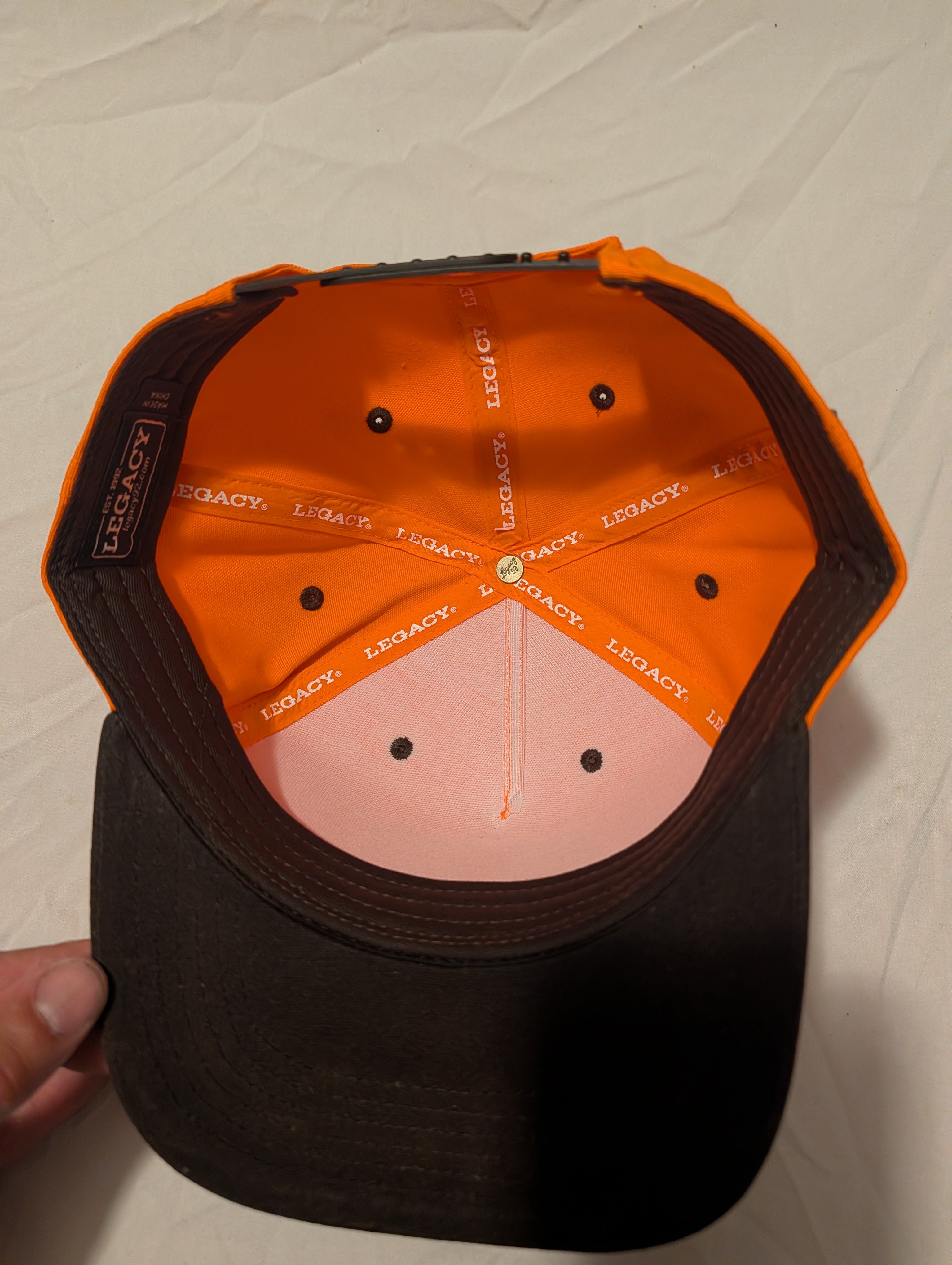 Hat: Blaze orange with brown bill